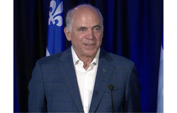Civil society groups in Quebec are urging the government to suspend Bill 69, which would allow greater private involvement in electricity production, following the resignation of Energy Minister Pierre Fitzgibbon, calling for a more democratic and ecologically focused energy policy. Photo: Screenshot of press conference on CPAC.