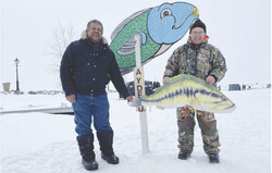 Pierre Lagacé from the Ville de Gatineau’s Recreations Department and Guy Rochon, President of the Aydelu Centre during the 2023 ice fishing derby. Photo: Alana Repstock, Aylmer Bulletin Archives