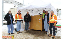 Members of CNL’s Decommissioning and Environmental Remediation team working on the stored liquid waste project. (CNL)