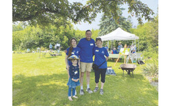 Aylmer Heritage Association (AHA) members and volunteers at the organization's annual plant sale. Left to right: Young volunteers Seppy Tigner and Sophia Easter-Fonda, Kevin Bosch, AHA president, Jayne Simms-Dalmotas, AHA member. Photo: Sophie Demers


