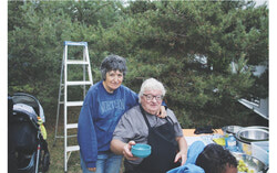 Suzanne Duperron and Pierre Duperron helping with the fruit salads, Friday, September 5th, 2025. Photo: Jude Osmond