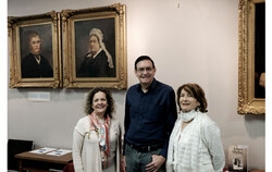 The president of the AHA, Kevin Bosch, in the center, the head of archives and restorer, Gabriela Sanchez, on the left, and the volunteer, Nicole Faubert, on the right, pose for a portrait. Photo: Christian Rochefort