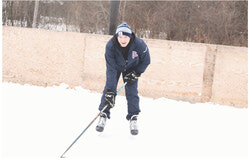Caden Provost playing hockey on the outdoor rink. Photo: Jude Osmond