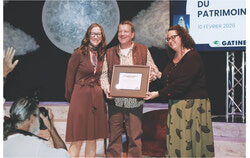 Marisol Carpenter and Edward Yeoman accepting the award for the exemplary restoration of the John Murphy house at 12 Broad Street in Old Aylmer at the Heritage Reception, February 12. Photo:  Christian Rochefort