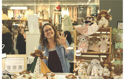 Camille Pelletier in front of her station, advertising her brand Creations Camomille at the Mamatinées event. Photo: Jude Osmond