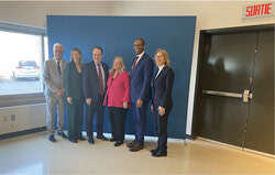 Ottawa is investing $3.6 million in the Université du Québec en Outaouais to establish a cyber range where defence suppliers can simulate and rehearse responses to cyberattacks targeting military supply chains. Stéphane Lauzon, Maude Marquis-Bissonnette, Steven MacKinnon, Murielle Laberge, Greg Fergus and Sophie Chatel. Photo: DEC