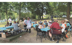 Seniors enjoying a Hawaiian day with activities on Thursday, June 25, as part of the Aylmer Food Bank's Seniors in Action program. Photo: Jude Osmond