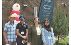 Vincent Roy, Municipal councillor for the Aylmer district, Yasser Mesri, event volunteer, Rachel Deslauriers, Municipal councillor for the Mitigomijokan district, and Rose El, event volunteer, at the open doors event on July 1. Photo: Jude Osmond