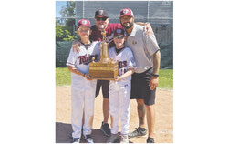 Aylmer's own Emery Tavarez and Jackson Mousseau helped the Ottawa West Twins rally past the Ancaster Diamondbacks to win the Ontario Little League Major title and reach the national championship in Glace Bay, Nova Scotia. Photo: Marie-Lou Desharnais. (Left to right: Emery Tavarez, Joey Mousseau, Jackson Mousseau and Henry Tavarez.)