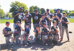 1st row (left to right - players) Parker Hitz, Louis Gagnon, Jackson Mousseau, Emery Tavarez, Anthony Vallières, Antoine Archambault. 2nd row (left to right) Henry Tavarez (Coach), Jonathan Hitz (Coach), Joey Mousseau (Head Coach), Luka Frost, Diego Saavedra, Frank Larouche (Coach), Olivier Larouche, Alain Gagnon (Coach) and Vincent Pellerin. Absent from photo: Coach Emilio Saavedra and Theo Papineau (Player)