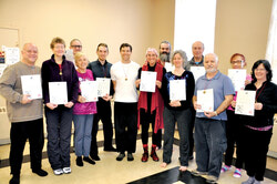 Blaise T. Ryan (centre) with new qigong instructors (from left) Rick Wedge, Diana Durnford, Nicolas Hanssens, Monique Massé, Marc-André Blanchard, 
Violette-Lise Duguay, Daniel Aarons, Naomi Sparrow, Serge Picard, François Leblanc, Bernadette Murray, Arlene Cybulskie. They were certified in Aylmer on 
March 26, after completing a six-month, 200-hour teacher training, given by Mr Ryan, Aylmer resident and local qigong and tai chi teacher.
Photo: William Pryor
