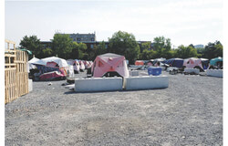 Around the Robert-Guertin Centre is a temporary housing encampment that, a few years ago, contained three – five tents along the stream’s escarpment. Photo: Christian Rockfort


